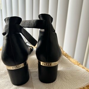 DKNY 2” heel Leather used. Comfortable medium to narrow fitting.